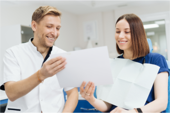 dental team reviewing documents